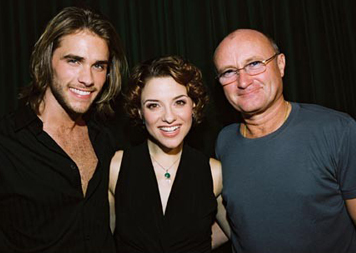 Nella foto di Lyn Hughes (© Disney 2005), da sinistra, Strickland e Gmabatese con il compositore Phil Collins.